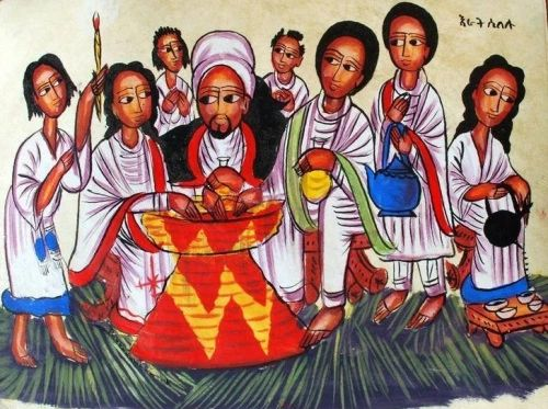A holiday meal, served on a traditional Mesob, with a coffee ceremony